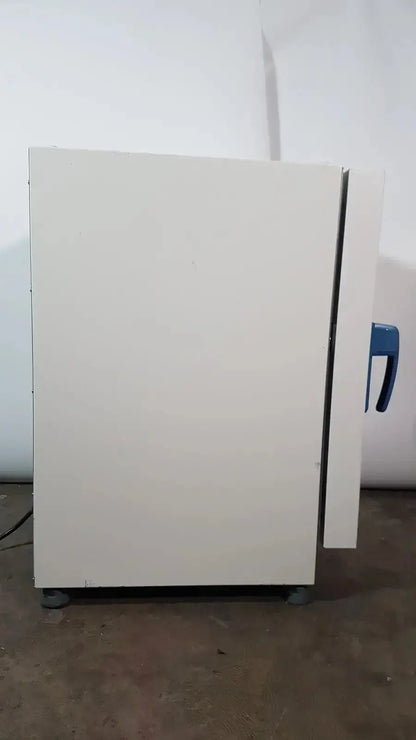 White laboratory oven with blue handle and gray casters of thermo scientific heratherm igs60 incubator model
