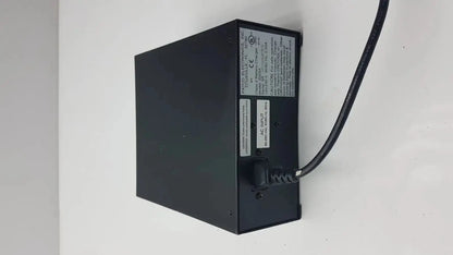 Black rectangular thermo scientific miran sapphire charger model 5025a with coiled cable and labeled specifications on side panel