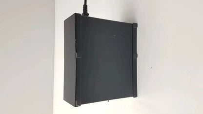 Black rectangular thermo scientific miran sapphire charger model 5025a wall-mounted device with cable extending from top
