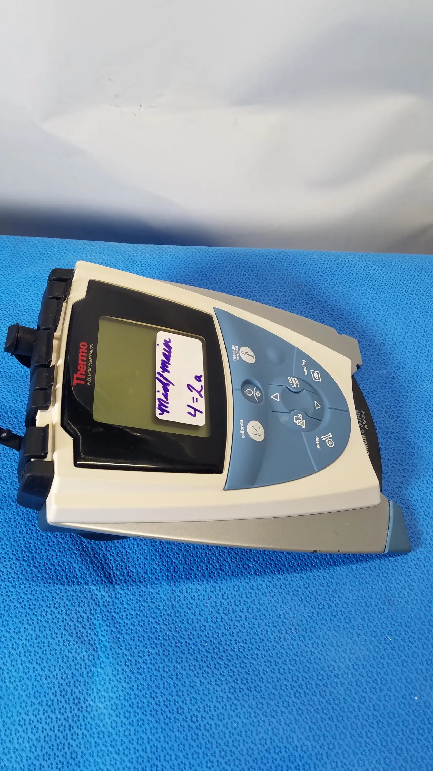 Thermo scientific model 42a handheld spectrophotometer with beige and blue casing for benchtop meter medical equipment use