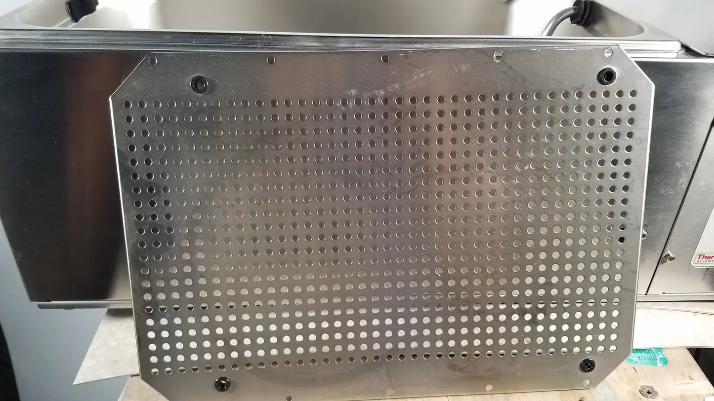 Stainless steel perforated panel with circular holes and screws on thermo scientific swb25 digital shaker water bath medical equipment