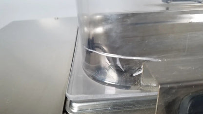 Clear plastic container with metallic base showing internal components of thermo scientific swb25 digital shaker water bath medical equipment