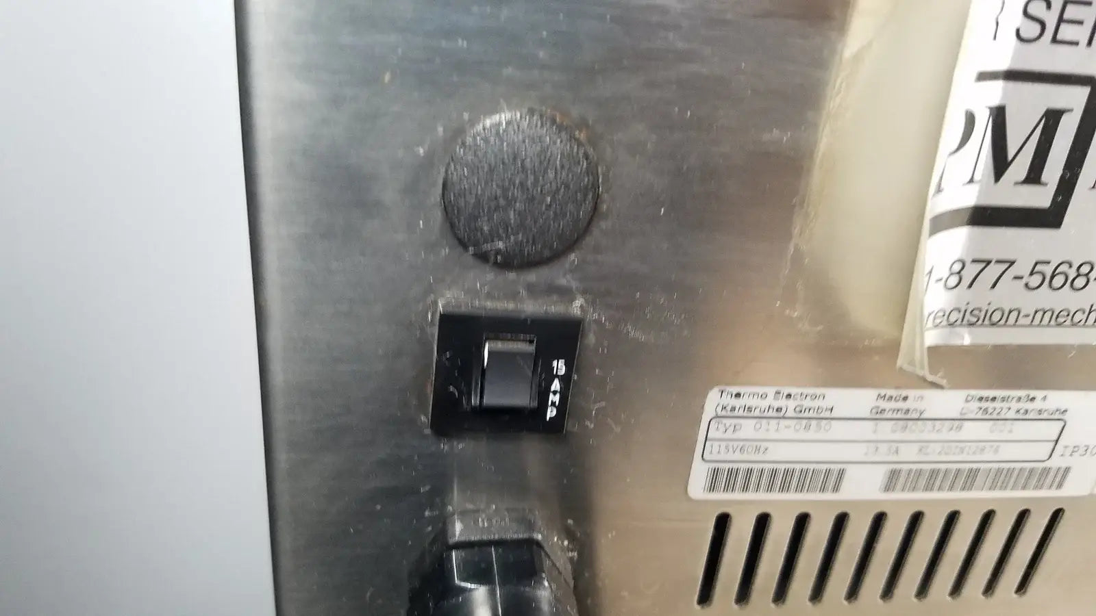 Stainless steel thermo scientific swb25 digital shaker water bath with black toggle switch labeled 15 a p and textured knob