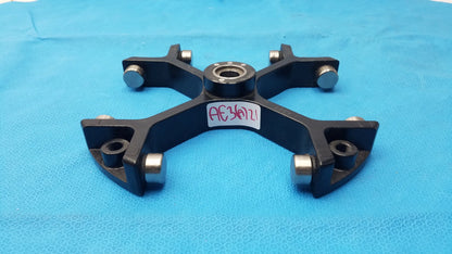 Black metal mechanical arm with silver cylindrical joints and central bearing in thermo sorvall 75006445 heraeus swing out rotor for reuse medical equipment