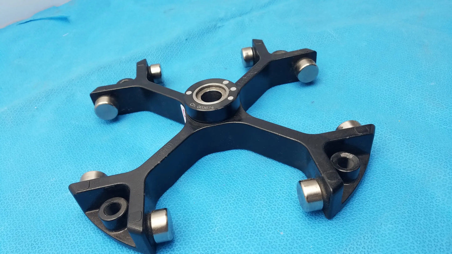 Black metal bicycle wheel hub adapter with silver bearings and central threaded hole for thermo sorvall 75006445 medical equipment reuse