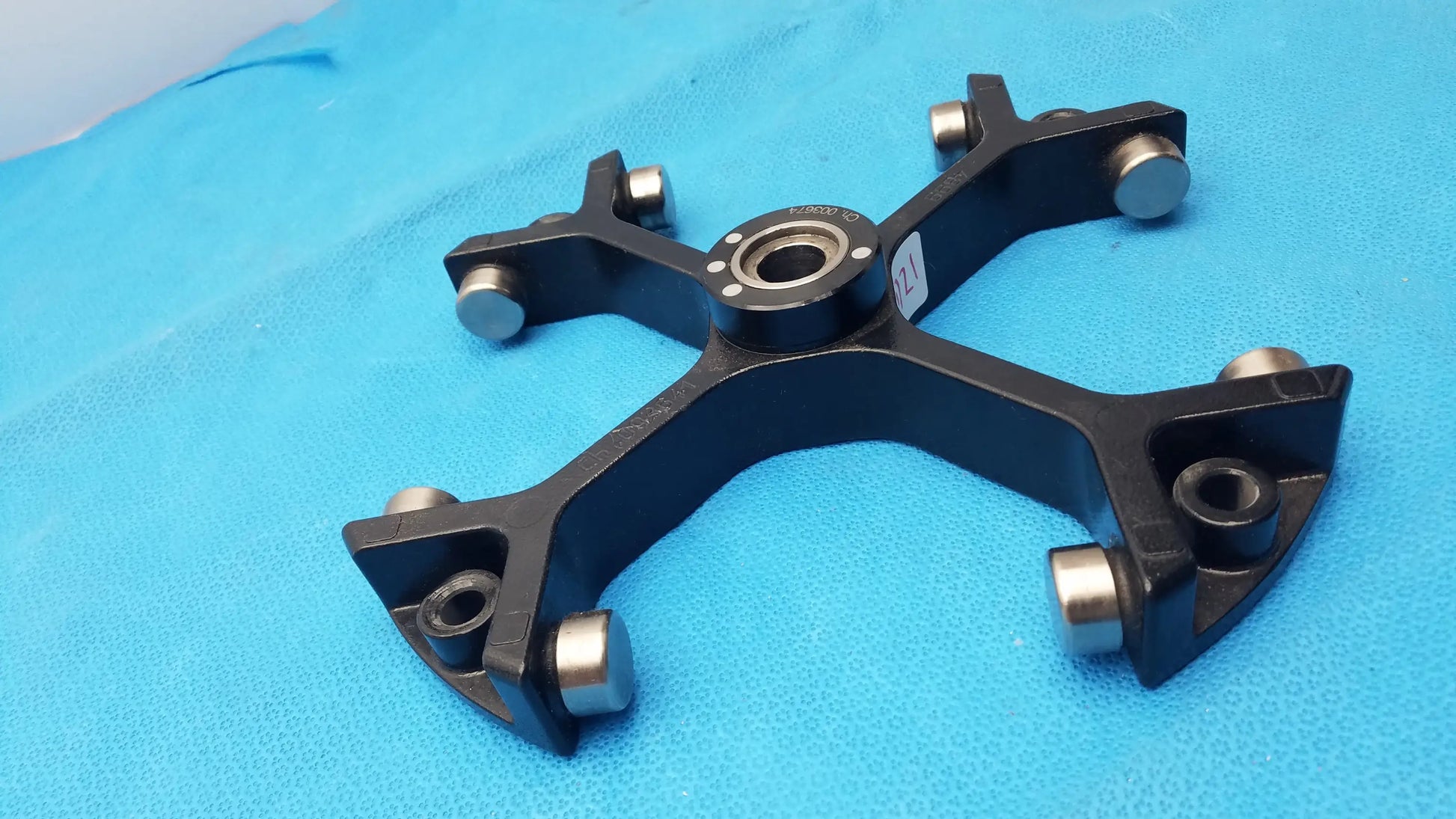 Black metal four-armed clamp with silver bearings for Thermo Sorvall 75006445 Heraeus swing out rotor medical equipment reuse