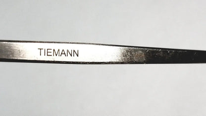 Tiemann surgical dermal curette size 4 medical equipment with polished silver finish and blackened edges stainless steel instrument