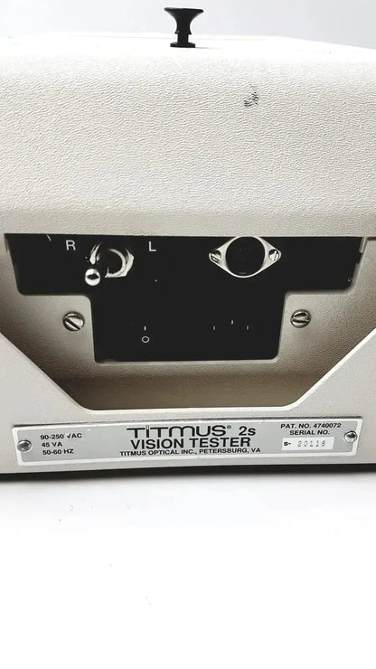 Beige textured plastic titmus optical ii vision tester with black control panel and silver铭牌 for vision testing