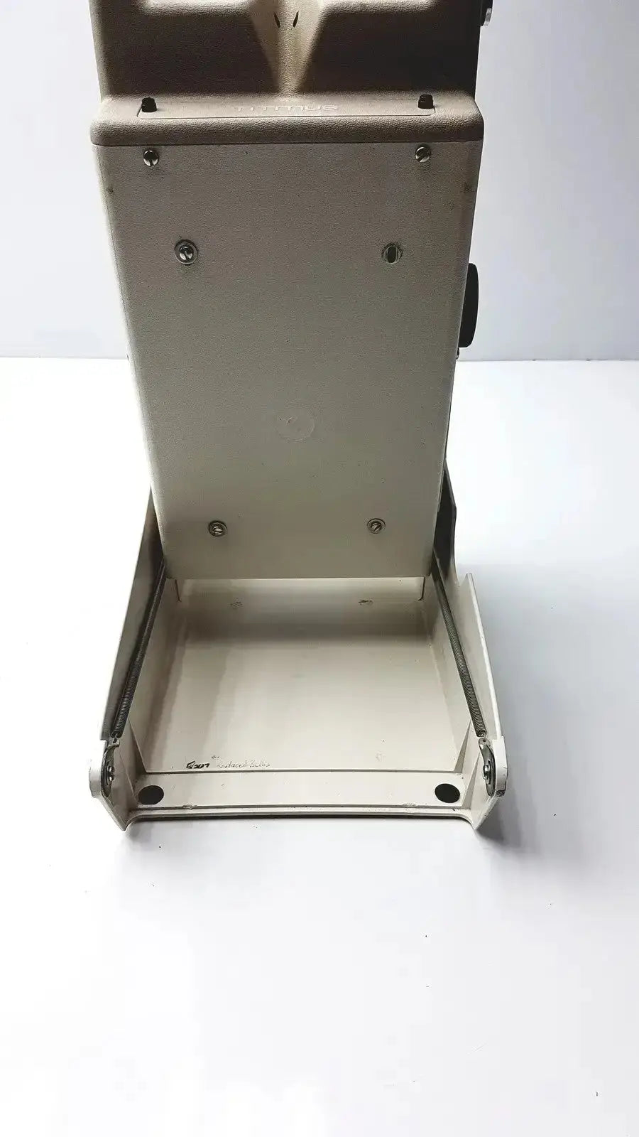 Beige metal folding case with sturdy industrial design and visible screws for titmus optical ii vision tester