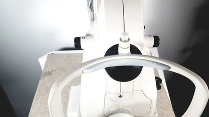 White retinal camera with black accents and curved handle topcon trc-nw8 used medical equipment for sale