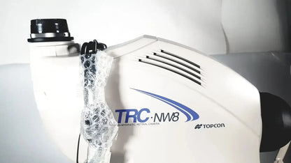 White topcon trc-nw8 non mydriatic retinal camera with blue branding and black ventilation slits used medical equipment for sale