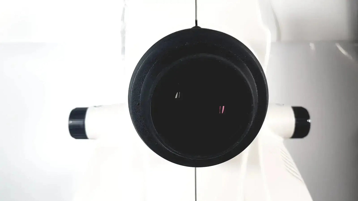 Black circular camera lens with white cylindrical components of topcon trc-nw8 retinal camera used medical equipment for sale