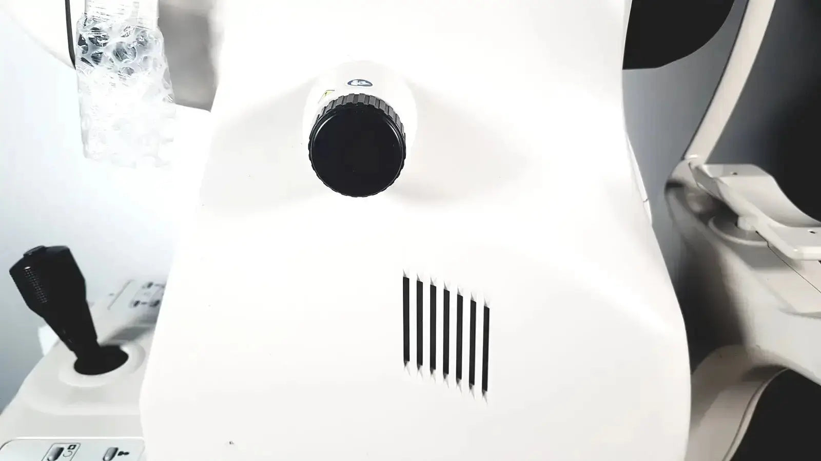 White retinal camera with black knob and vertical ventilation slits topcon trc-nw8 used medical equipment for sale