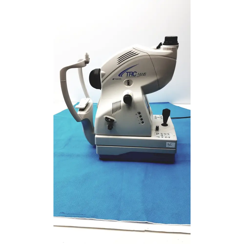 Gray and black tomei trc-nm8 slit lamp biomicroscope with a sleek, ergonomic design.