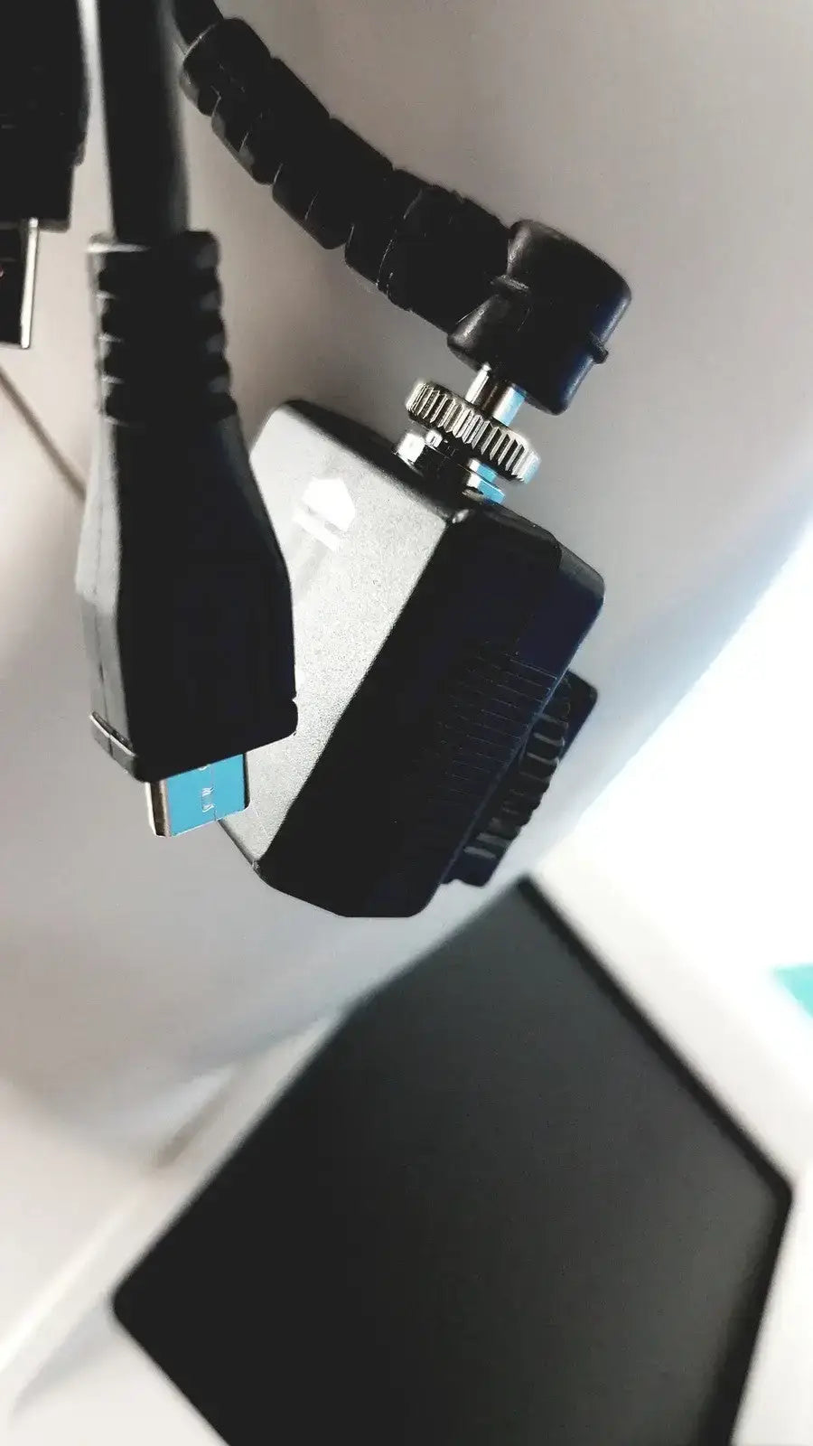 Black and silver usb-c to hdmi adapter with knurled adjustment knob for digital fundus imaging in retinal camera system