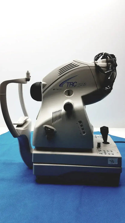 Silver and black topcon trc-nw8 non-mydriatic retinal camera with ergonomic design for digital fundus imaging use