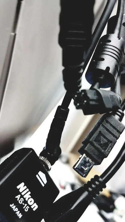 Black nikon as-15 camera hot shoe adapter with matte finish and cables for topcon trc-nw8 digital fundus imaging retinal camera