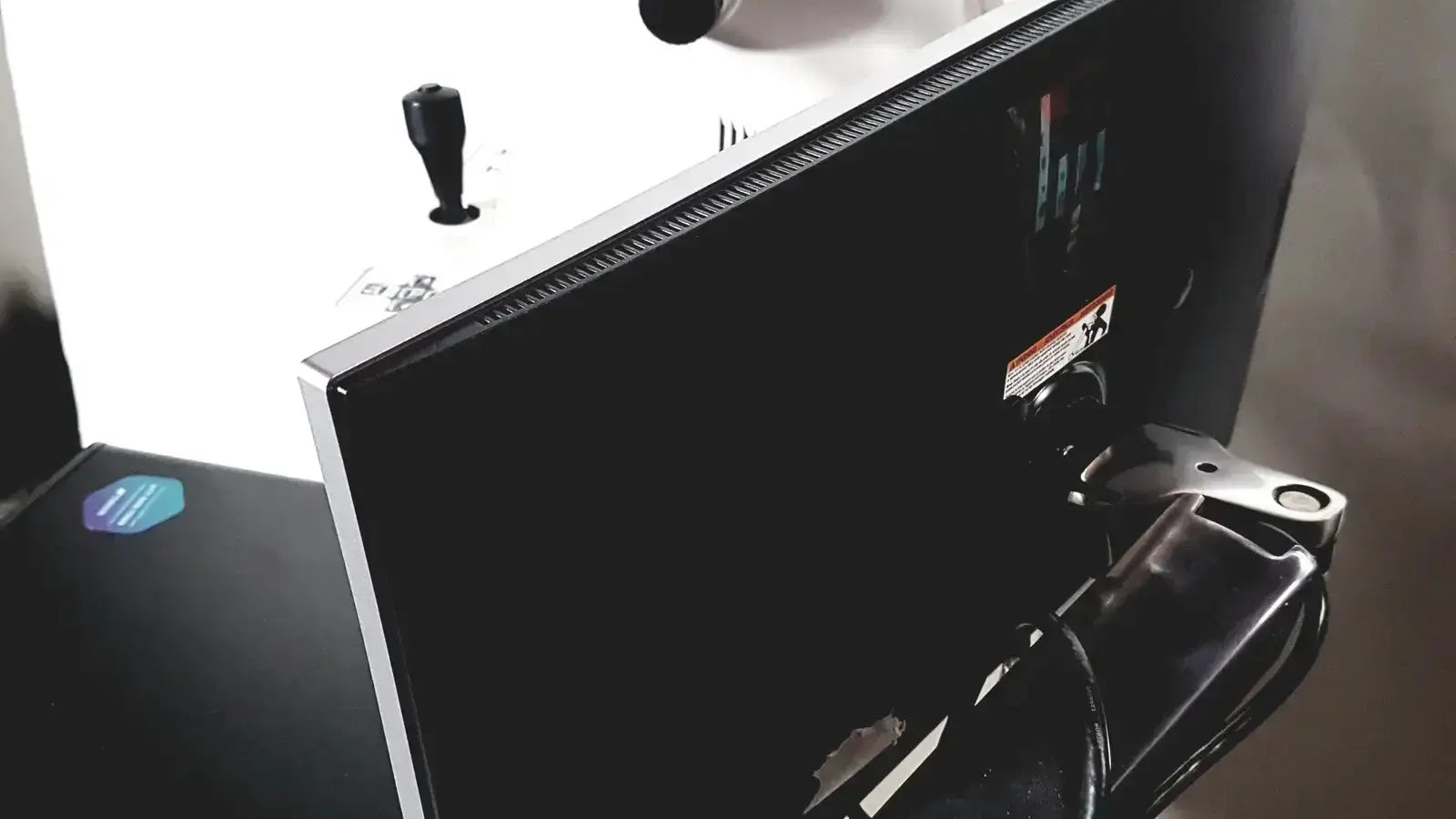 Black monitor with silver bezel and stand attached to topcon trc nw8 retinal camera for precise eye imaging