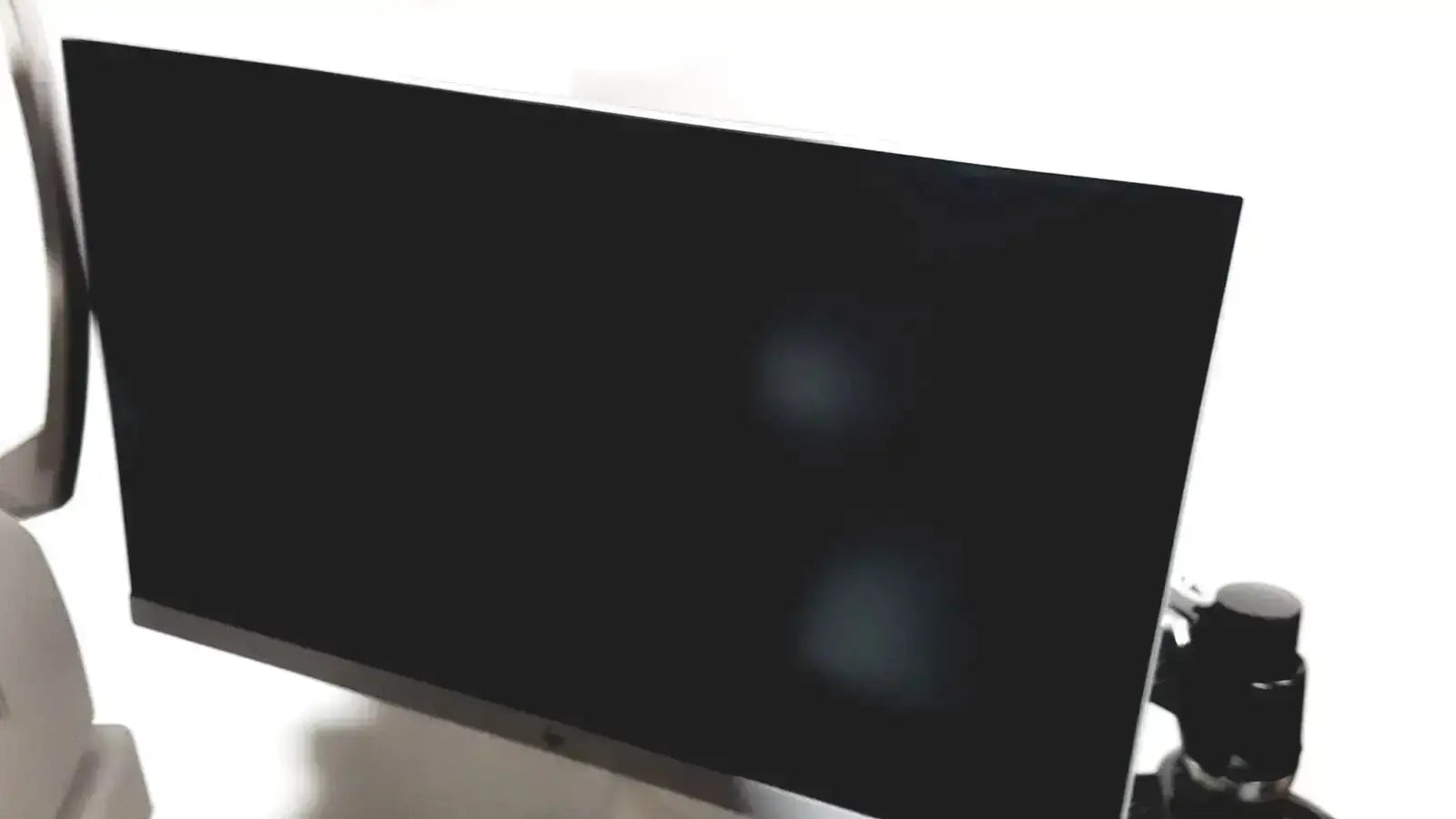 Black flat-screen monitor with slim bezel and glossy finish for topcon trc nw8 retinal camera system