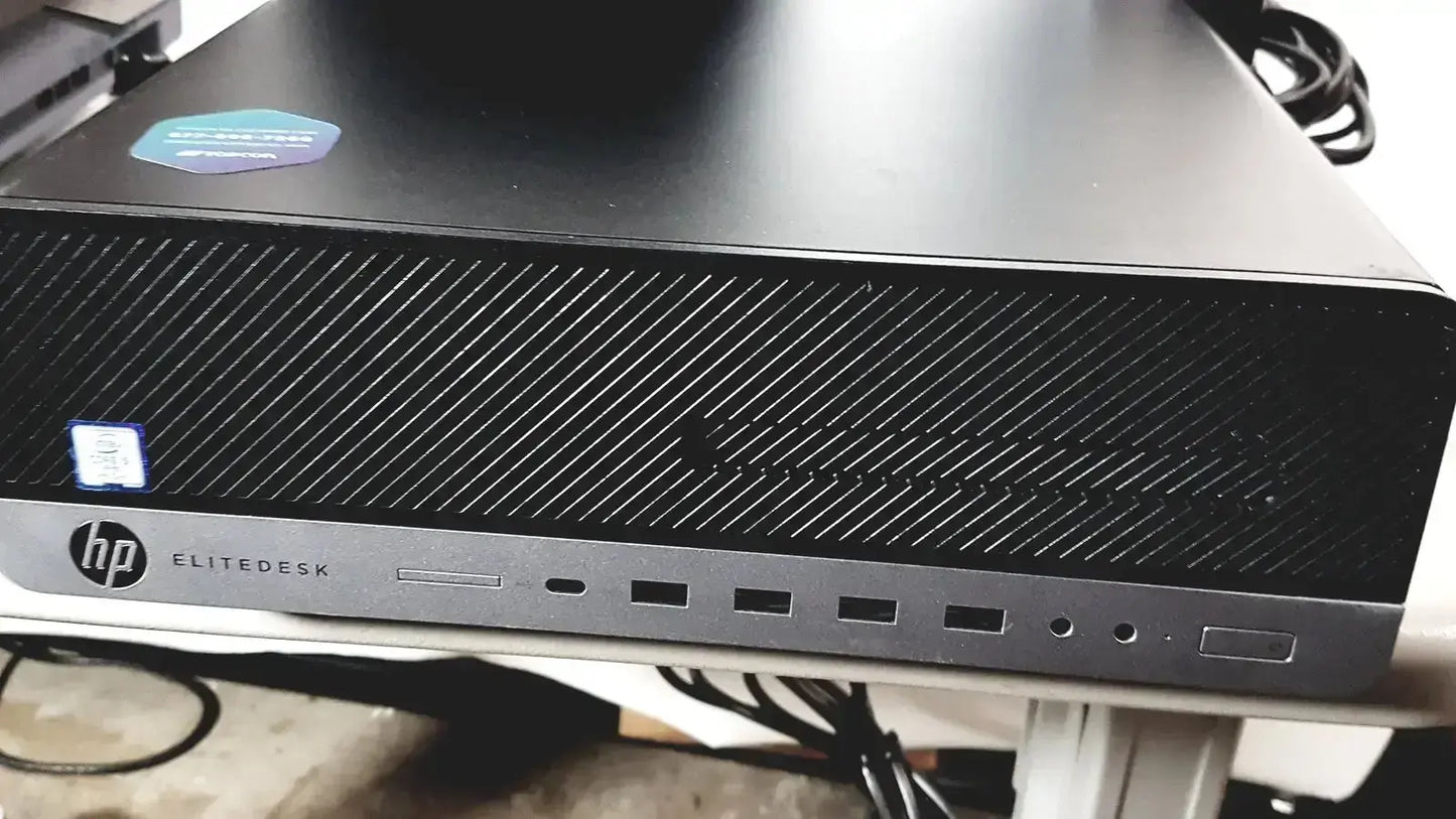 Black hp elitedesk desktop with textured front panel and multiple ports for topcon trc nw8 retinal camera system