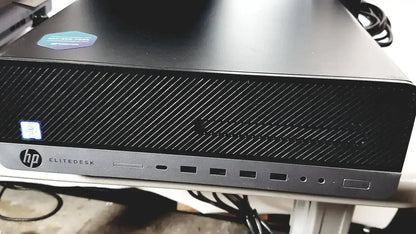 Black hp elitedesk desktop with textured front panel and multiple ports for topcon trc nw8 retinal camera system