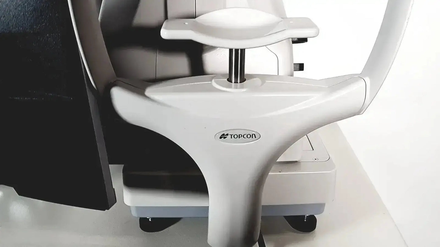 White plastic and metal topcon trc nw8 retinal camera with curved arm and adjustable headrest for eye examination