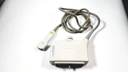 White Toshiba PVT-382BT 3.5 MHz ultrasound transducer probe with green circular buttons and coiled gray cable
