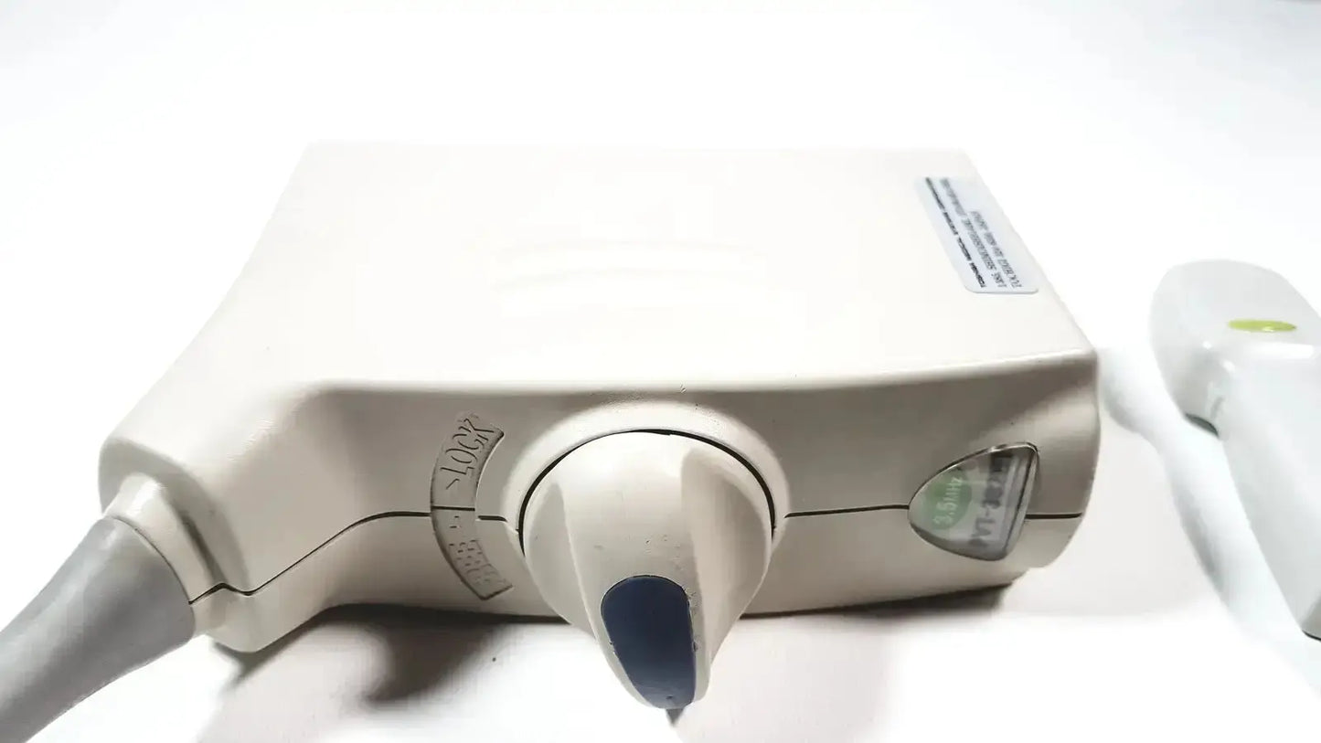 Beige Toshiba PVT-382BT ultrasound transducer probe with blue-tipped handle and gray cable for medical imaging