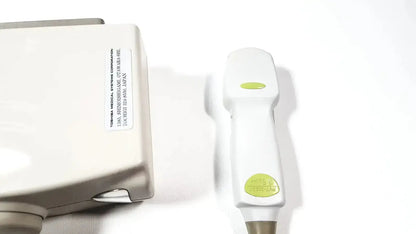 White Toshiba PVT-382BT 3.5 MHz ultrasound transducer probe with green button and matching console unit