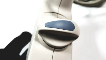 White plastic car door handle with blue accent panel on the back side of toshiba pvt-382bt ultrasound transducer probe