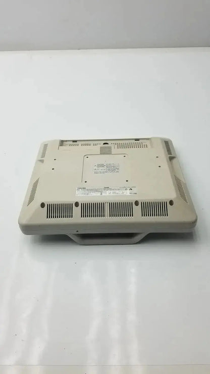 Beige plastic toshiba ta500 medical lcd monitor bsm31-7130 with integrated handle and ventilation grilles underside view