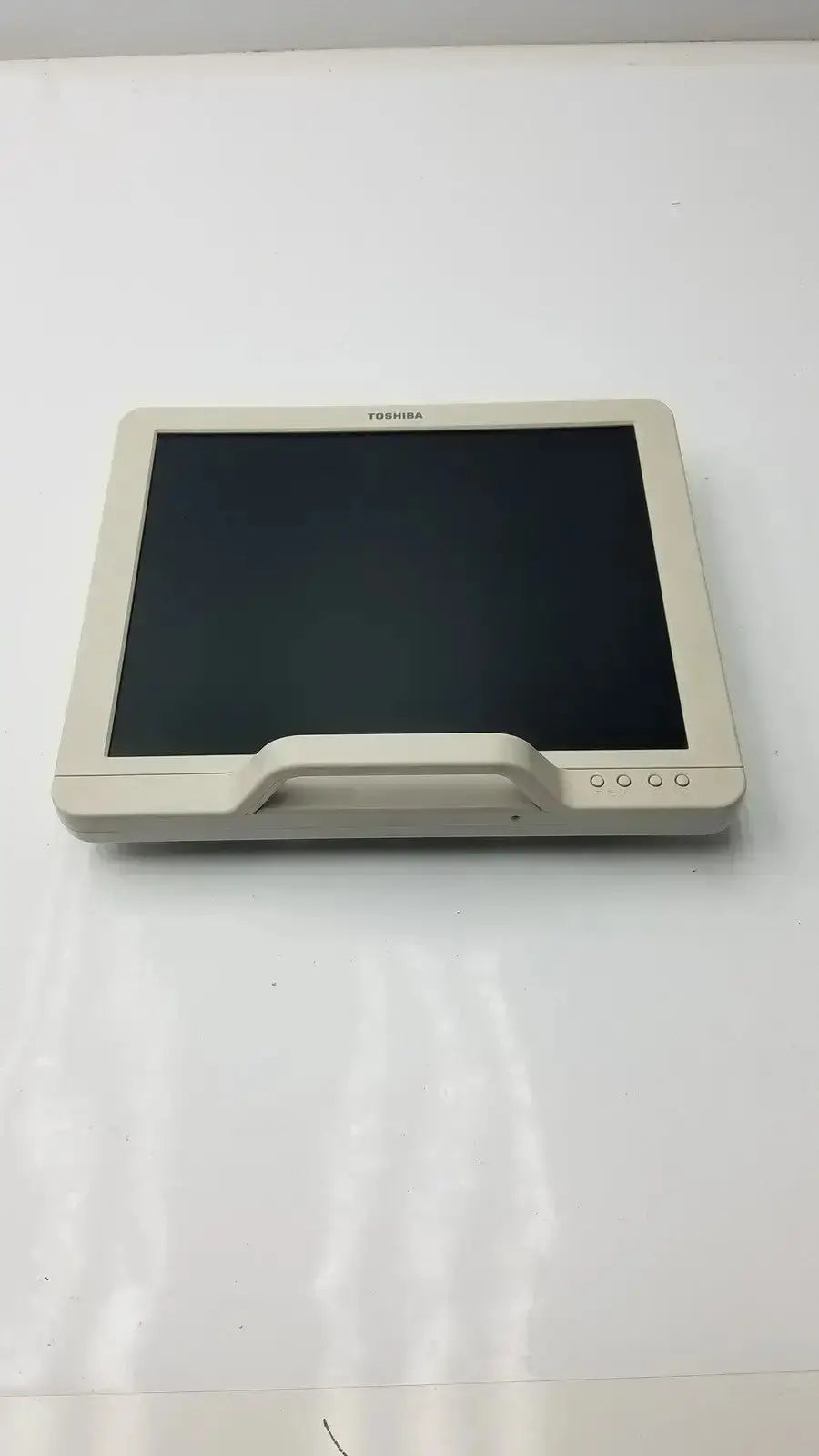 Beige toshiba ta500 medical lcd monitor bsm31-7130 with sleek rectangular design and integrated bottom handle