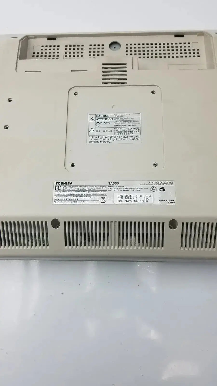 Beige toshiba ta500 medical lcd monitor bsm31-7130 rear view with ventilation grilles and model label visible