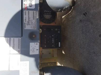 Black toshiba power supply unit with ventilation fan and control panel for diagnostic ultrasound machine back side