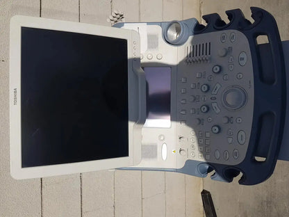 Toshiba Xario XG SSA-660A diagnostic ultrasound machine with white screen and gray control panel for diagnostic ultrasound