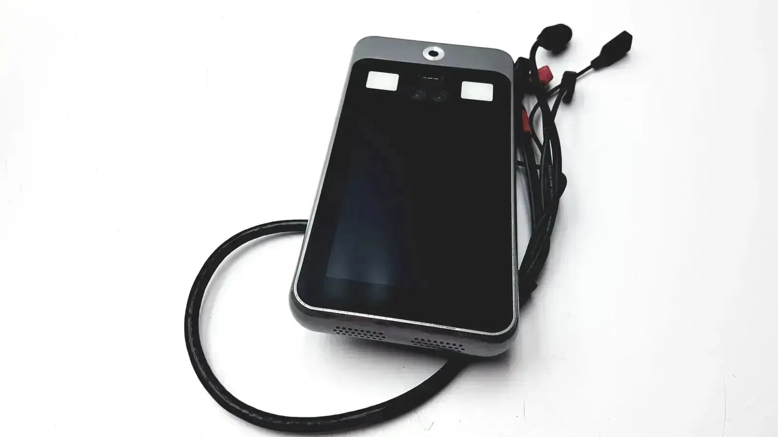 Black rectangular turing body temperature thermal scanner with silver frame and two white sensors connected to black cable