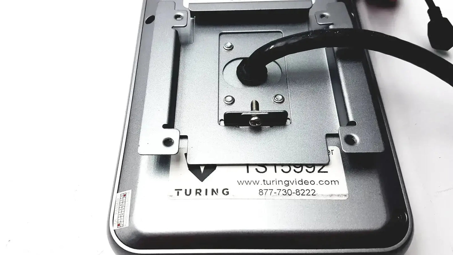 Silver metal mounting bracket with black cable attached to the back of turing body temperature thermal scanner model tvts-op-btts 7-g2