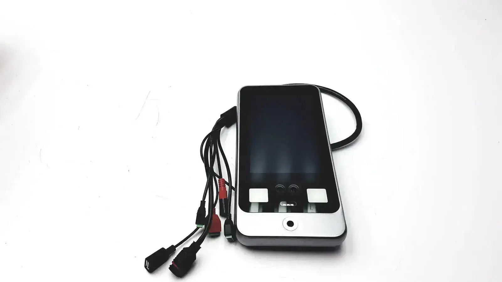 Silver-framed turing body temperature thermal scanner smartphone with black screen and multiple attached cables