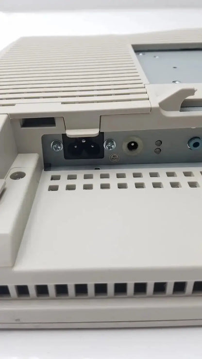Beige plastic computer tower backside with power port and ventilation grilles for tyco electronics et1729l-7uwa-1-rtmd touchscreen monitor hospital surplus