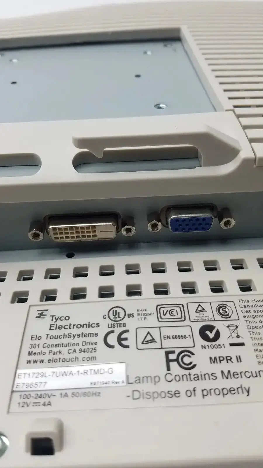 White plastic touchscreen monitor by tyco electronics with dvi and vga ports ideal for hospital surplus use