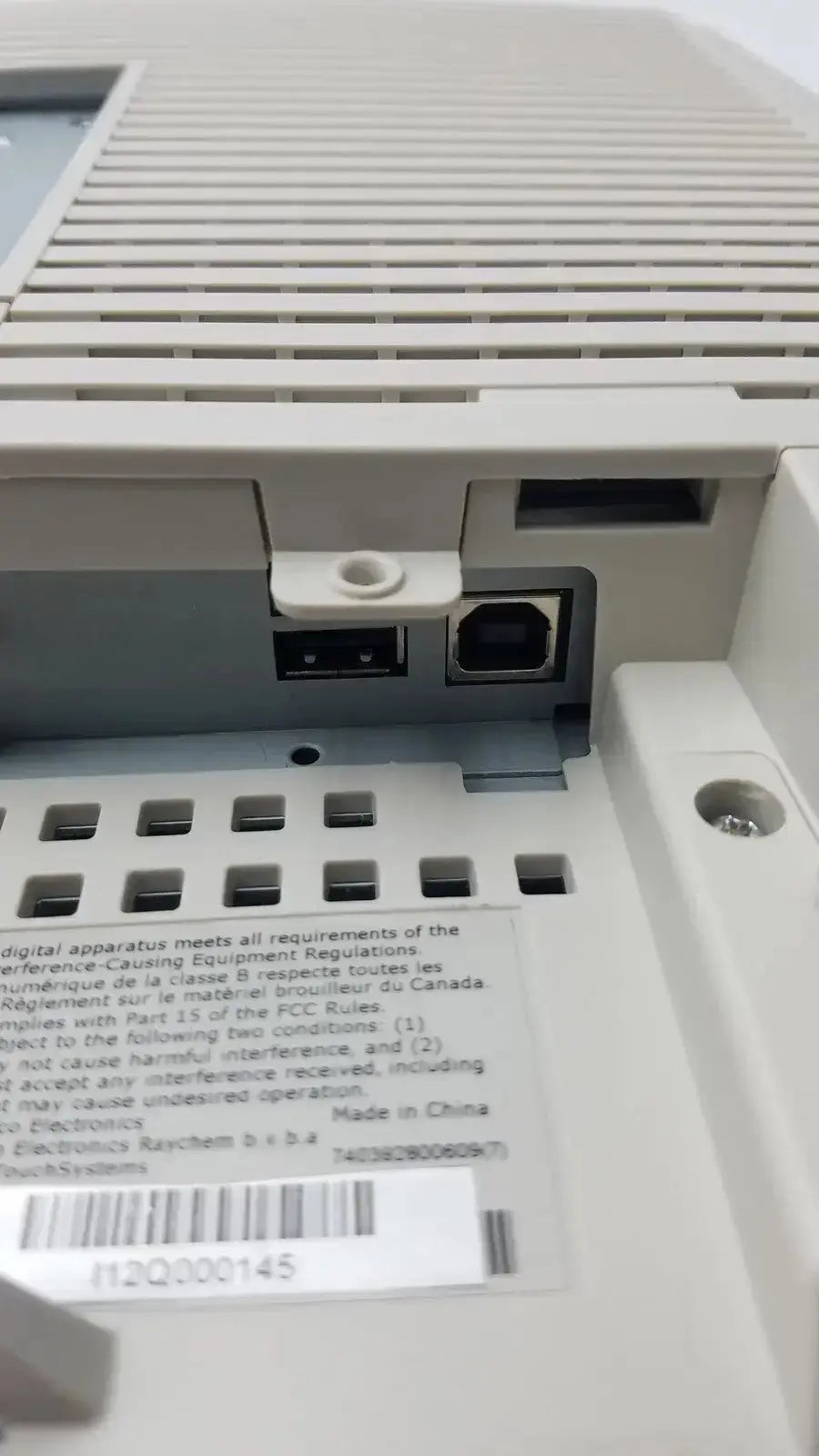 Back side of gray plastic tyco electronics et1729l-7uwa-1-rtmd-g touchscreen monitor with vented panel and ethernet port for hospital surplus