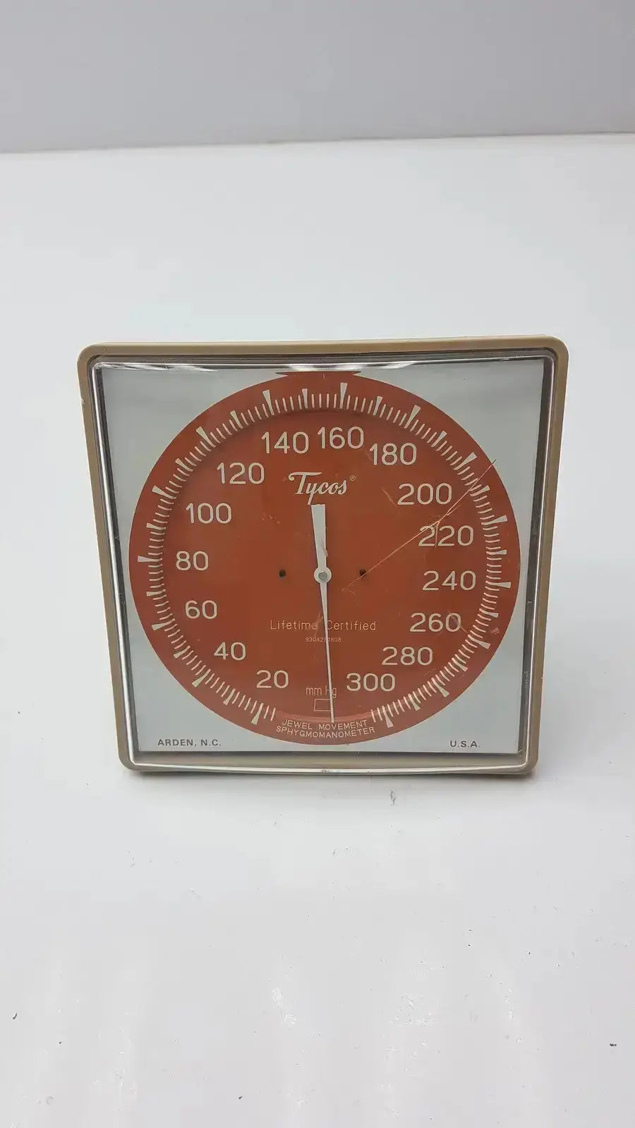 Vintage red and silver tycos lifetime certified jewel movement analog blood pressure monitor with metal frame