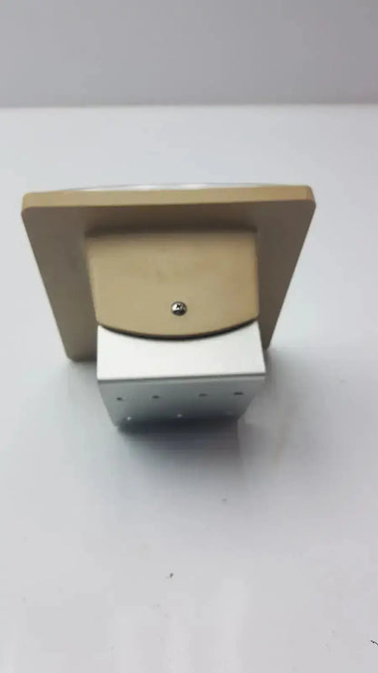 Gold-toned metal wall-mounted electrical outlet cover with silver screw fastener for tycos lifetime certified jewel movement sphygmomanometer