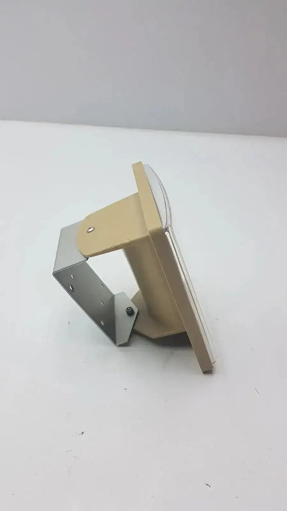 Beige and silver metal bracket assembly with screws for tycos lifetime certified jewel movement sphygmomanometer