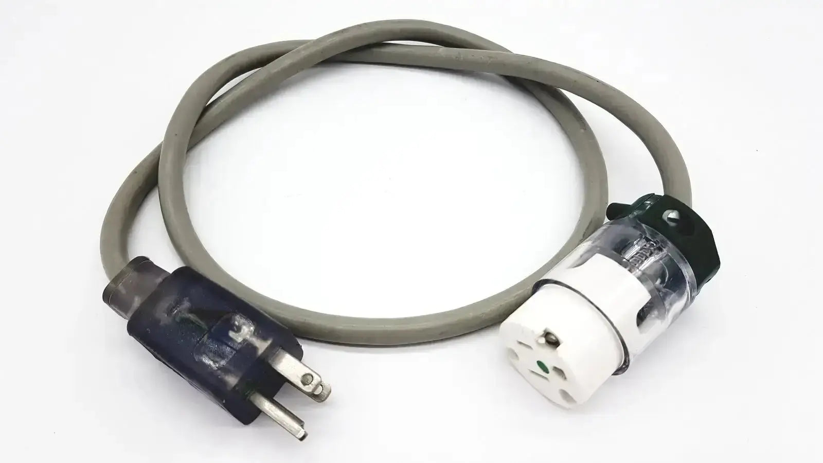 Gray standard outdoor mini extension cord with black plug and white transparent socket connector for outdoor use