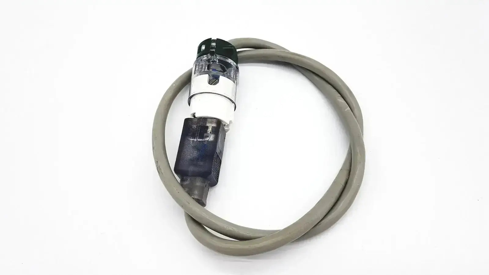 Gray coiled ul standard outdoor mini extension cord with black and transparent plastic connector housing