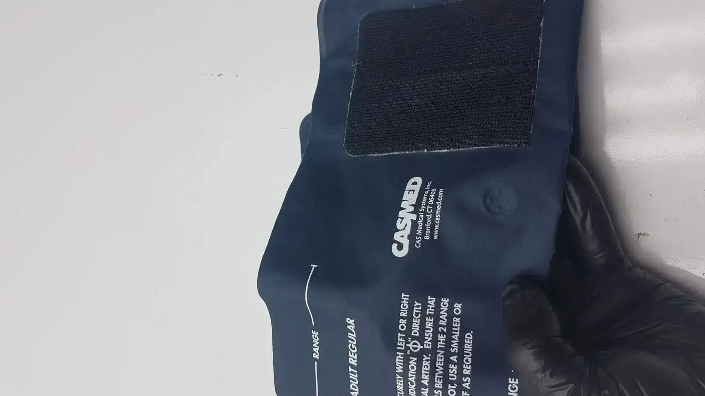 Ultra Check blood pressure cuff U2635 is a dark blue latex free blood pressure cuff with black velcro and white text