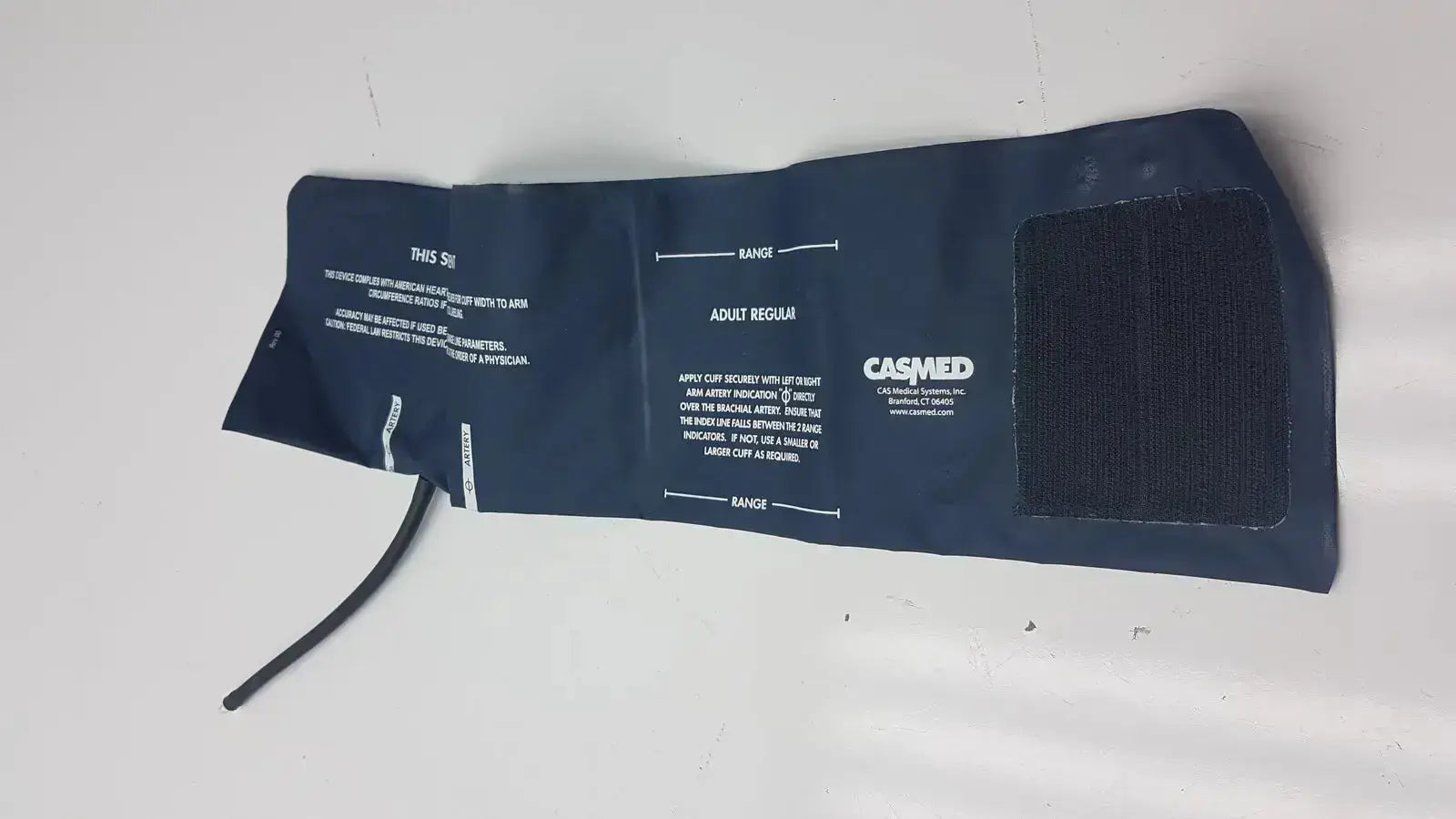 Dark blue casmed adult blood pressure cuff with black tubing and velcro strap ultra check latex free pressure cuff