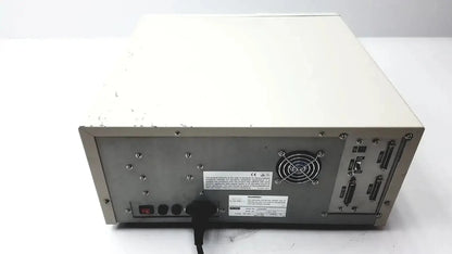 Rear panel of beige and silver ultramark bio-rad microplate imaging system showing ventilation ports warning labels and power cord