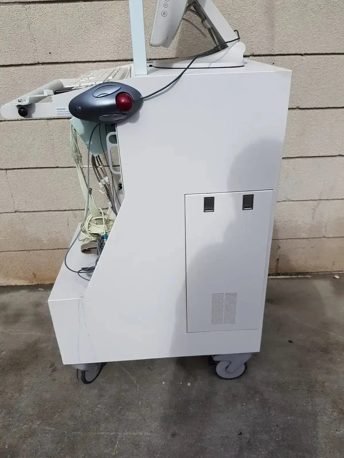 White medical imaging lhs vascular cart with mounted monitor keyboard and mouse from multilab series ii lhs